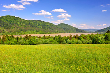 Fototapeta premium Klimkowskie Lake with turbid water after a flood, Low Beskids (Beskid Niski), Poland