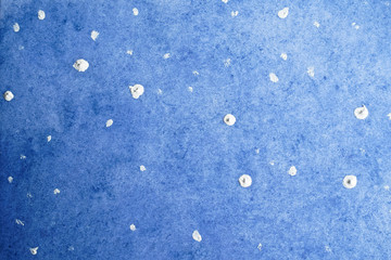 Abstract drawing of stars with oil paints on a watercolor background.