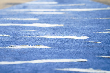 White stripes with oil paints on a watercolor background.