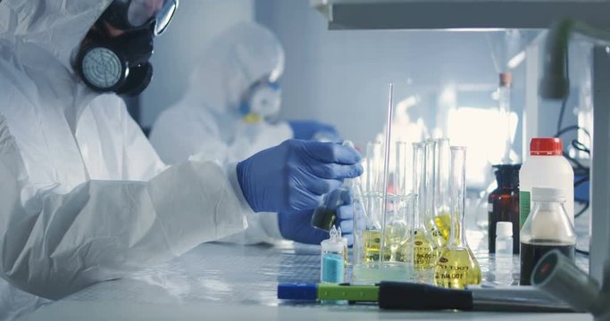 Scientists working in laboratory