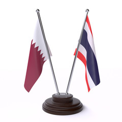 Qatar and Thailand, two table flags isolated on white background. 3d image