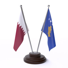 Qatar and Kosovo, two table flags isolated on white background. 3d image