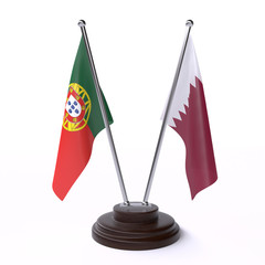 Portugal and Qatar, two table flags isolated on white background. 3d image