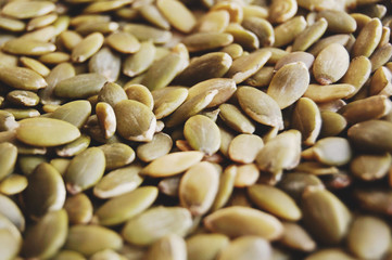 Raw pumpkin seeds background