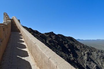 The ancient Great Wall from Ming Dynasty and the Gobi desert in Jiayuguan, Gansu province, China. 