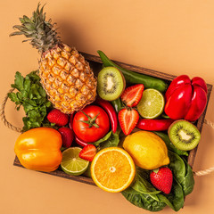 Fruits and vegetables rich in vitamin C in box.