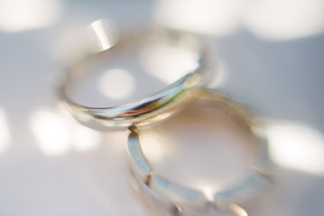 Wedding rings close-up macro shot. Rings of the bride and groom