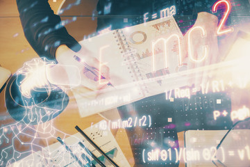 Science formula hologram over woman's hands taking notes background. Concept of study. Multi...