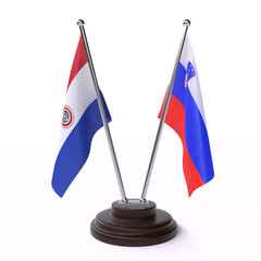 Paraguay and Slovenia, two table flags isolated on white background. 3d image