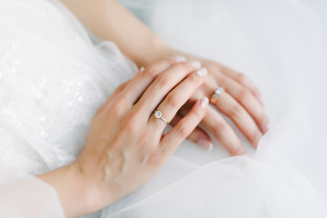 Man and woman hold hands close up