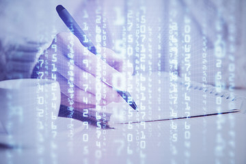 Fototapeta premium Double exposure of writing hands on background with data solution hologram on front. Technology concept. Close up