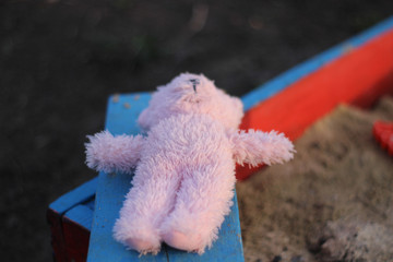 Children's soft toys left at the site