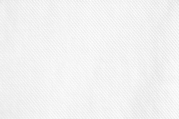 Closeup white blank paper napkin with grooved surface texture background.
