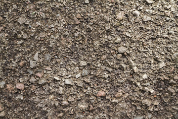 Sand and stone wall texture background.