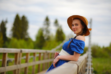 Girl in the countryside in the evening