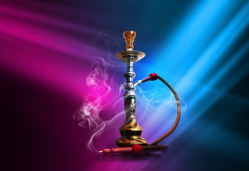 Hookah, smoke on a dark abstract background. Background of empty scenes with multicolored neon...