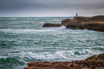 Headland at Robe, South Australia with crashing waves