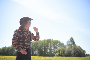 A man with a guitar on summer day outdoors