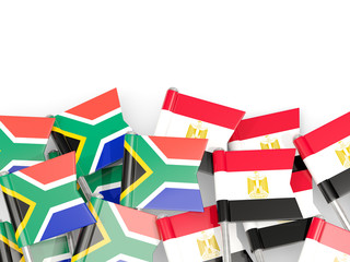 Pins with flags of South Africa and egypt isolated on white.