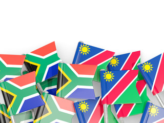 Pins with flags of South Africa and namibia isolated on white.