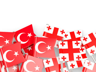 Fototapeta na wymiar Pins with flags of Turkey and georgia isolated on white.