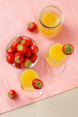 Mimosa cocktail and strawberries
