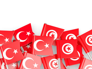 Pins with flags of Turkey and tunisia isolated on white.