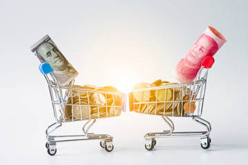 US dollar and Yuan banknote inside cart for tariff trade war between United States and China which...