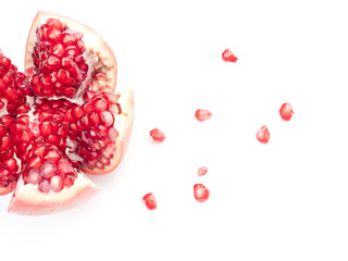 Red pomegranate fruit, isolated on a white background
