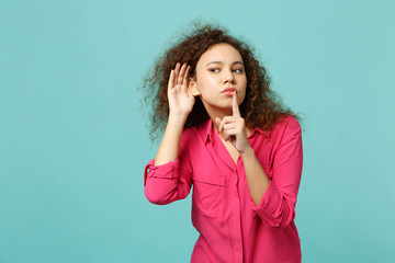 Curious african girl eavesdrop hearing, saying hush be quiet with finger on lips shhh gesture...