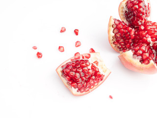 Red pomegranate fruit, isolated on a white background