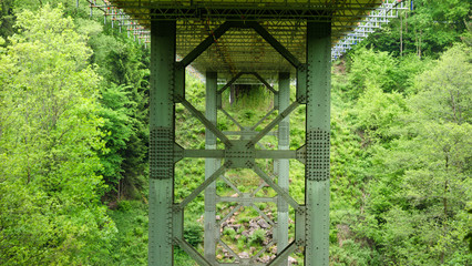 pillars under a train bridge