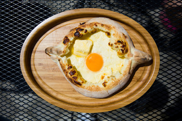 Traditional Georgian adjarian khachapuri cheese bread