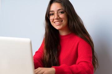 Happy Teenager student girl studying in a table