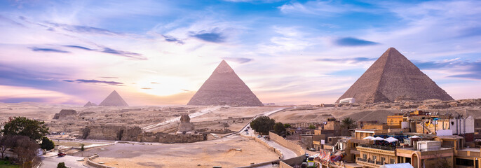 Pyramids and Sphinx at sunset - obrazy, fototapety, plakaty
