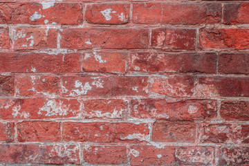 Texture, brick, wall, it can be used as a background. Brick texture with scratches and cracks