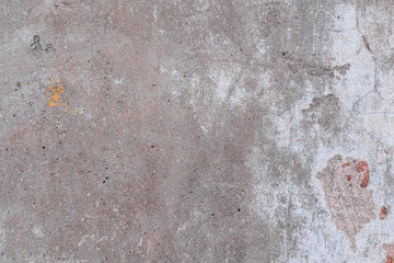 Texture, wall, concrete, it can be used as a background. Wall fragment with scratches and cracks