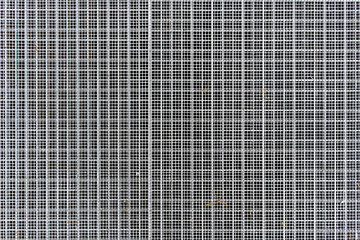 background gray metal grill with small sections