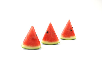 Watermelon slices on white background with selective focus