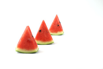 Watermelon slices on white background with selective focus