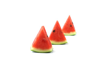 Watermelon slices on white background with selective focus