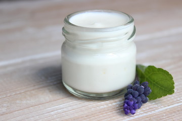 Organic face cream with purple flowers