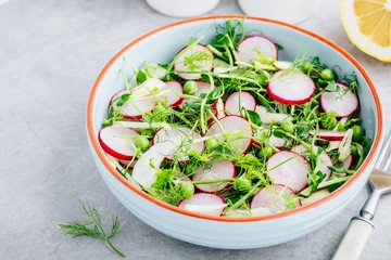 Fresh summer fennel salad with pea shoots and radishes