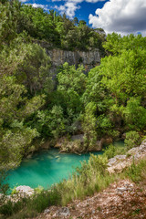 River in the forest. Hiker route in the 