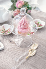 Delicate pink apple marshmallow hand-made in a glass transparent vase. Congratulate. Sign of attention. Marshmallow, dessert. Background.