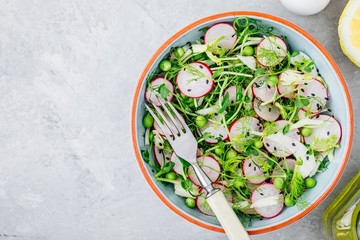 Fresh summer fennel salad with pea shoots and radishes