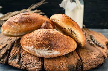Russian national bread Kalach on a wooden background. National bread products