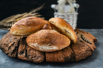 Russian national bread Kalach on a wooden background. National bread products