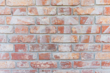 red rubbed brick wall. Beautiful brick background.