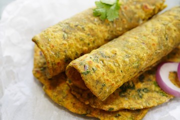 Gujarati Methi Thepla - Indian flatbread Paratha with fenugreek leaves, selective focus